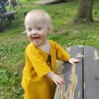 Toddler with Down syndrome at Renfaire