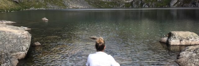 Woman looking at lake.