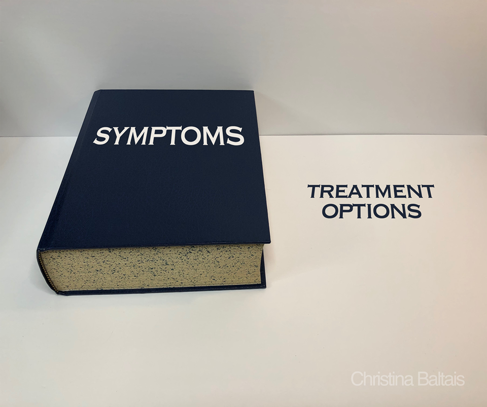 Photo of a large blue book, reading "Symptoms". Beside it is an empty place with the words "treatment options" where a book should be