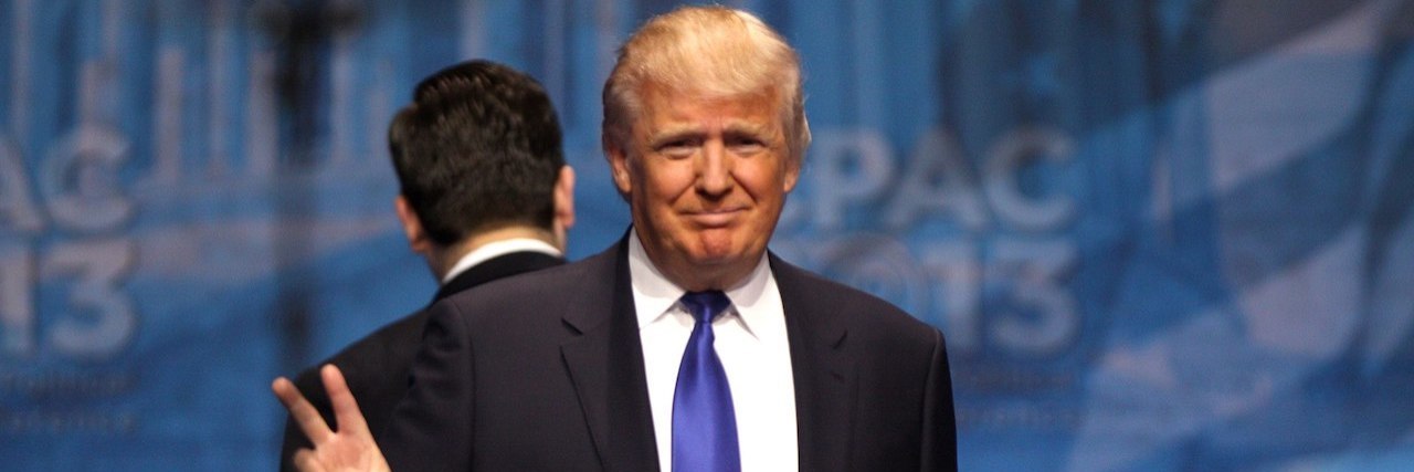 Is the Trump Administration Helping or Hurting Health Care? Donald Trump giving a peace sign