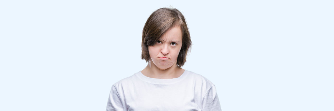 Ending Use of the 'R-Word' at Work Angry woman with Down syndrome.