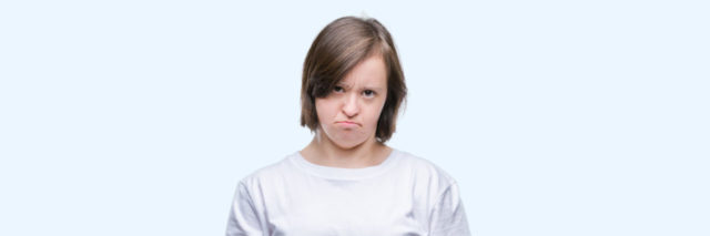 Angry woman with Down syndrome.