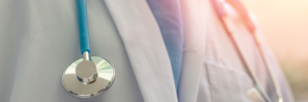 The Problem With Being Too Polite During a Doctor's Appointment Medical doctor or physician in white coat with stethoscope in hospital or clinic