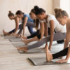 Group of women practicing Pilates.