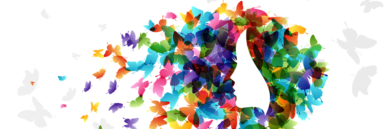 4 Things No One Tells You About Autism Woman with hair from butterflies.