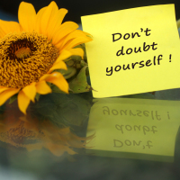 dont doubt yourself on a note with a sunflower