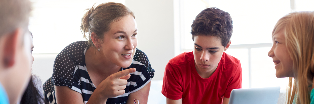 Raising a Child With Autism as a Special Education Teacher Teacher with students.