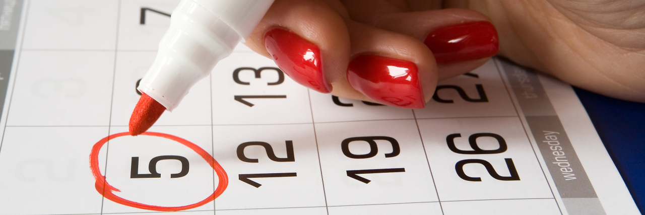 Tips for Planning Ahead and Managing Life With Fibromyalgia a calendar with a woman circling the "5th" date on it.