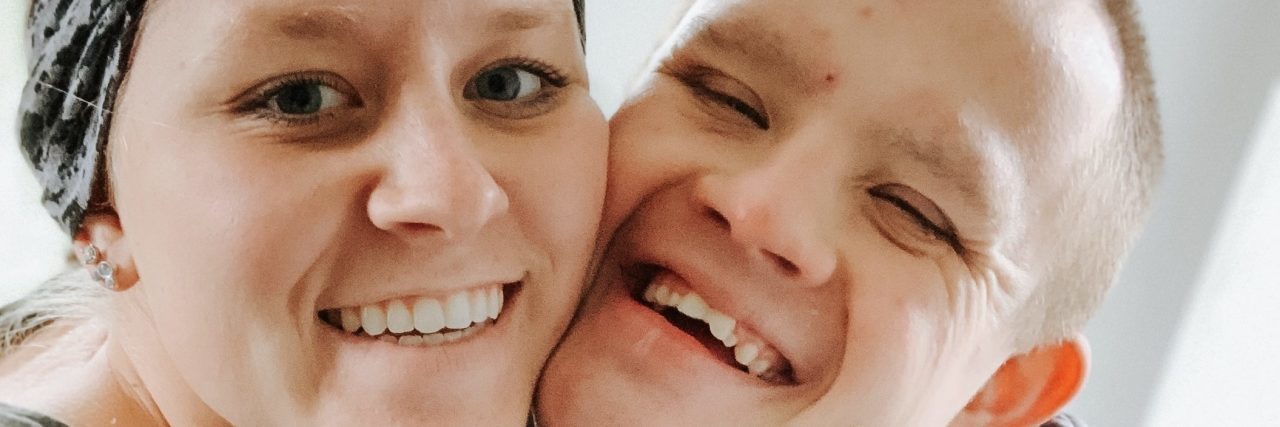 Moving Beyond Acceptance to Justice for People With Disabilities Erin with her brother who has Down syndrome.