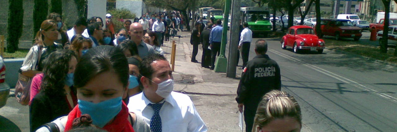 The Threat of the Flu Versus the Wuhan Coronavirus People wearing face masks in Mexico