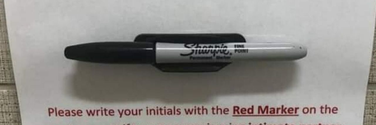 Domestic Violence Prevention Sign Asks Patients to Write in Red Marker Red and black marker sign to support domestic violence survivors