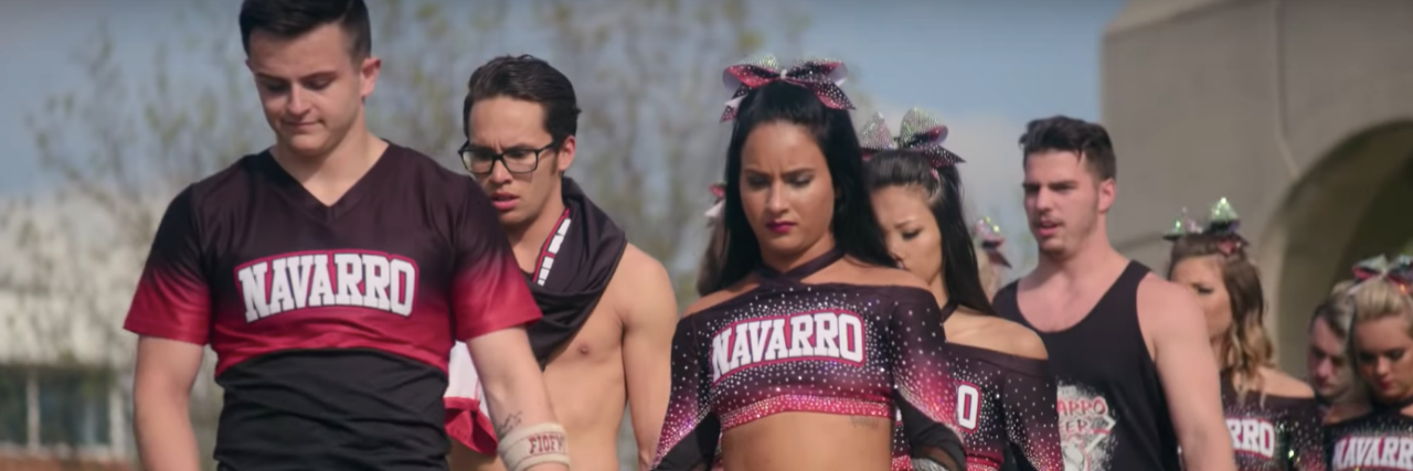 4 Mental Health Lessons From the Netflix Docuseries 'Cheer' Cheerleaders walking in a line in their uniform