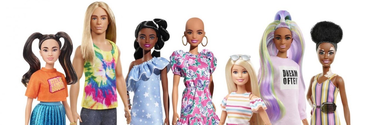 After Success of Wheelchair-Using Barbie, Company Rolls Out Dolls With Hair and Skin Differences New Fashionista Barbies with vitiligo, wheelchair user and prosthetic limbs