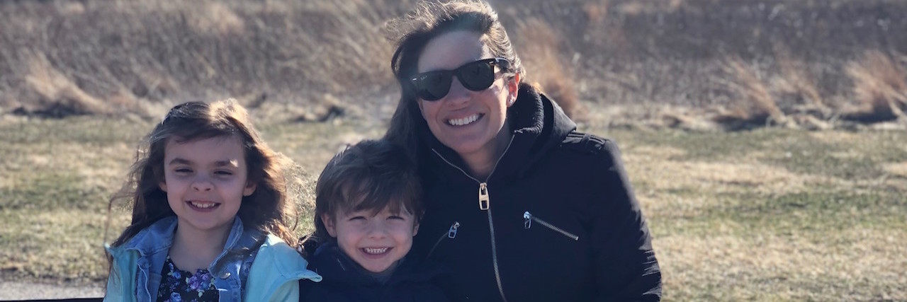 Celebrating My Sobriety for Me and My Family Woman sitting on a bench outside with two children