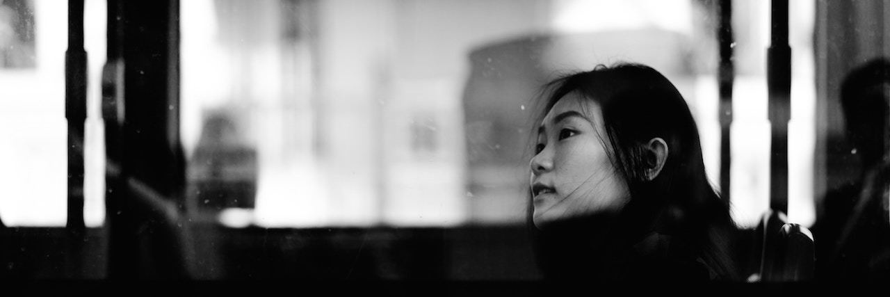 How Forgiveness Helps Me Heal From Childhood Trauma Profile of woman riding on a bus