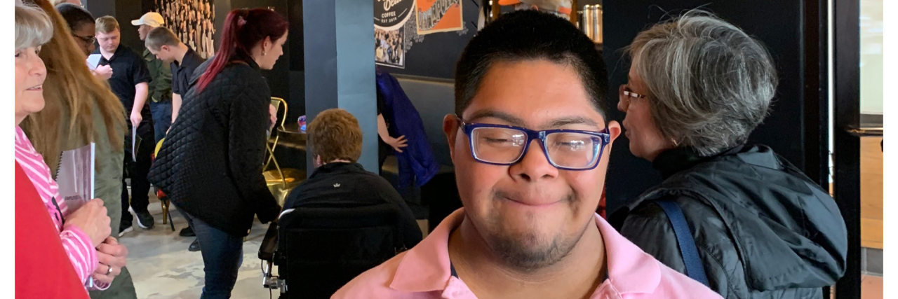 Raising Society's Low Expectations for People With Disabilities Michelle's son celebrating getting his new job at Bitty and Beau's Coffee.