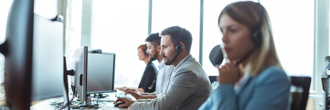 Transitioning to a New Job as Someone With Autism Colleagues working in a call center.
