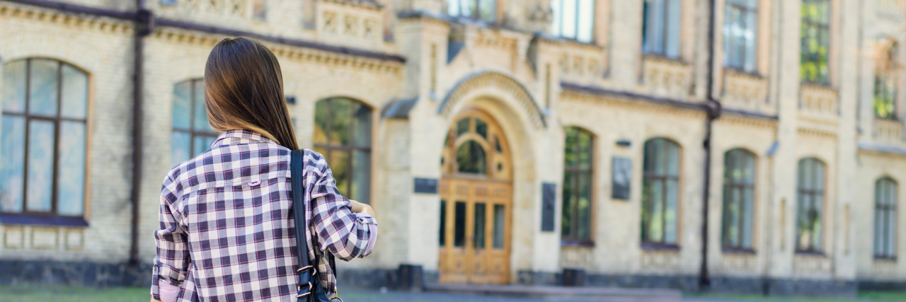 Helping Your Child With a Health Condition Prepare for Adulthood and College Young woman with backpack at her first day at university.