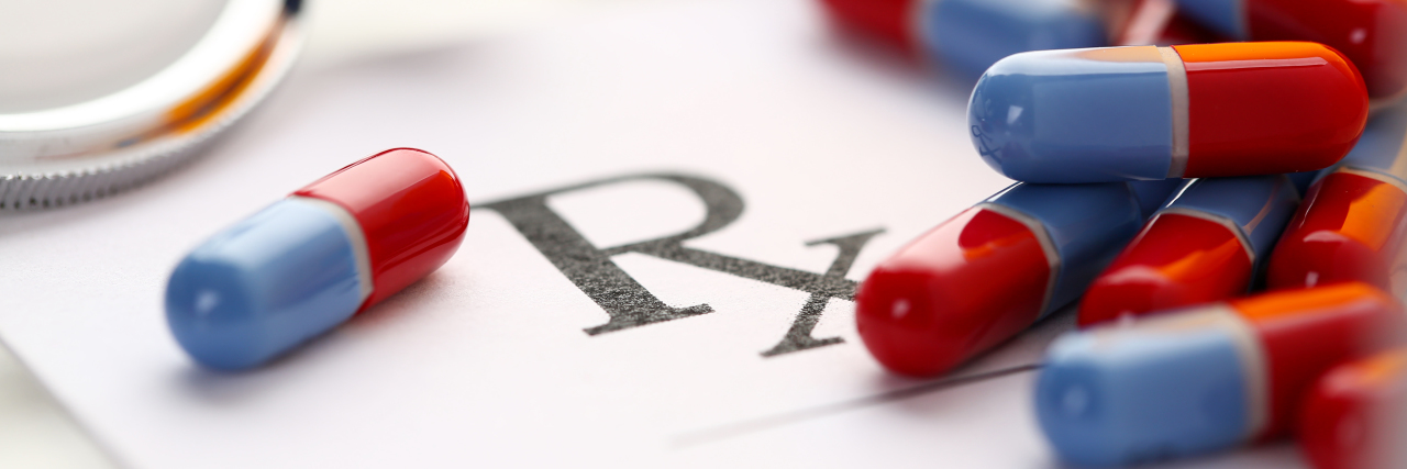 Fighting Insurance for Access to Crohn's Disease Medication Crohn's disease Rx prescription pills and bottle.