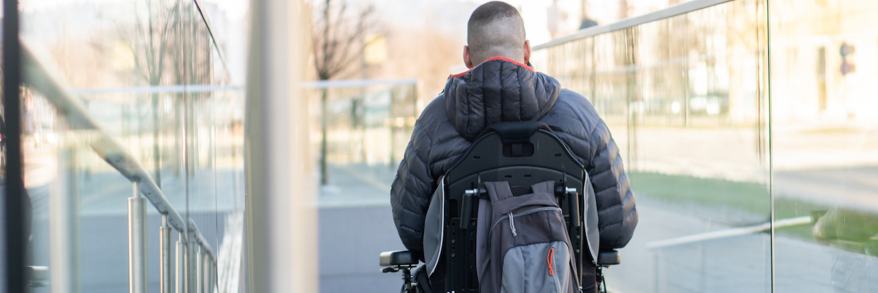 5 Things You Should Know About Spinal Muscular Atrophy Man in a wheelchair using a ramp next to stairs