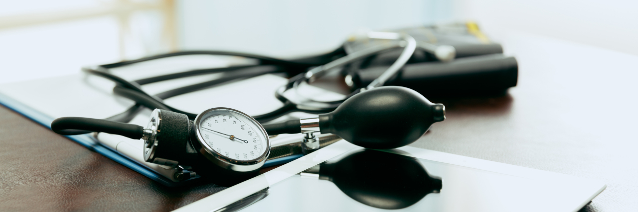 Why We Must Talk About Medical Gaslighting Medical instruments and equipment for checking blood pressure.