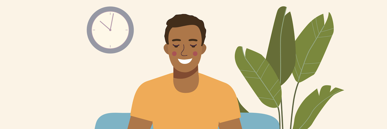 What It's Like Spending Much of Your Life as an Undiagnosed Dyslexic Illustration of Black man sitting on comfy chair with a laptop