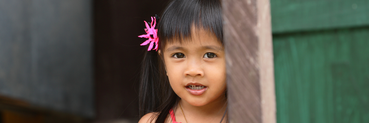 Orphan girl in China.