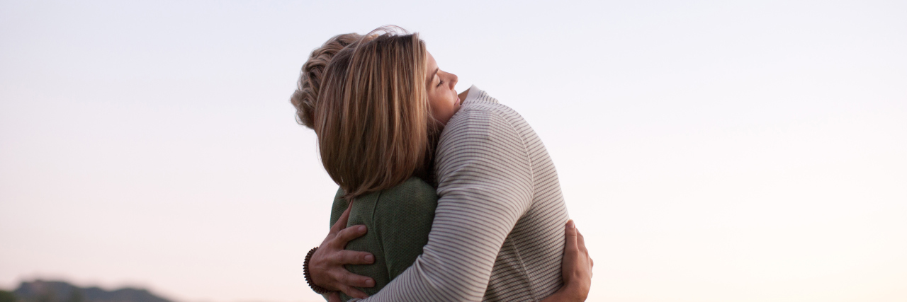 A Letter to My Husband, From His Wife With Depression husband and wife hugging each other outside