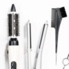 Various hair styling tools on white background.
