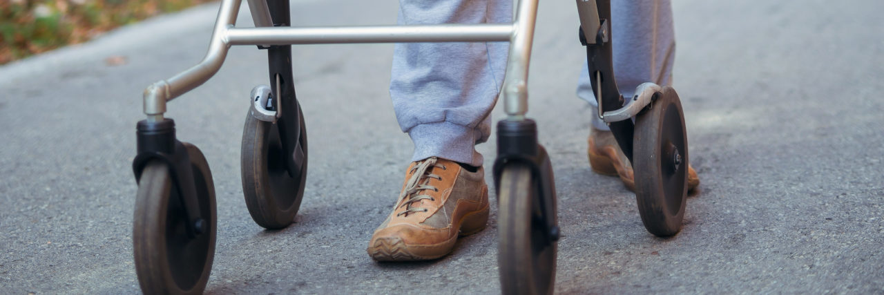 Finding Strength in Vulnerability With Cerebral Palsy Man using a rolling walker.