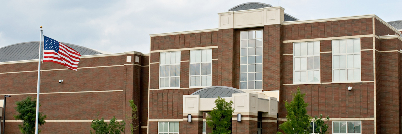 Police Called After 6-Year-Old With Down Syndrome Makes 'Threat' School Building with Flag