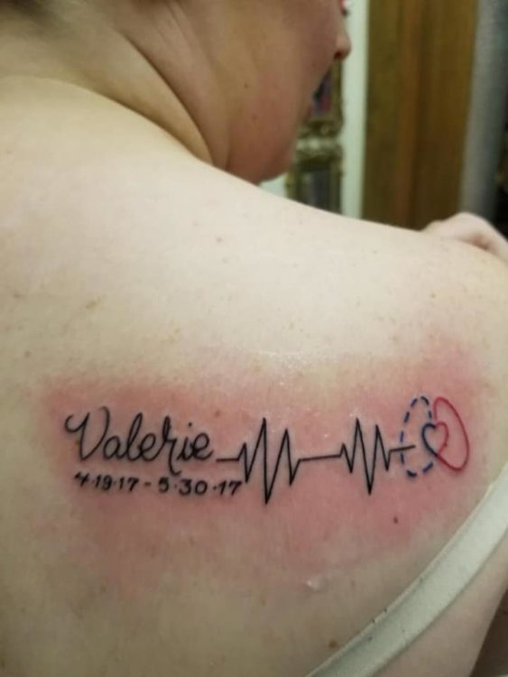 tattoo of "Valerie" and the heart monitor signal 