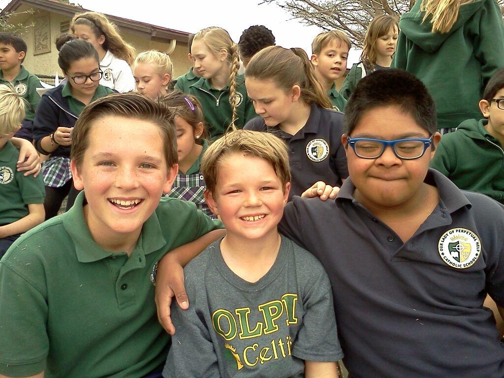 Raymond with a group of friends at school.