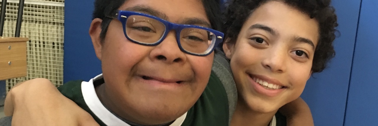 How School Disability Inclusion Promotes Future Community Inclusion Raymond with a friend on the basketball team.