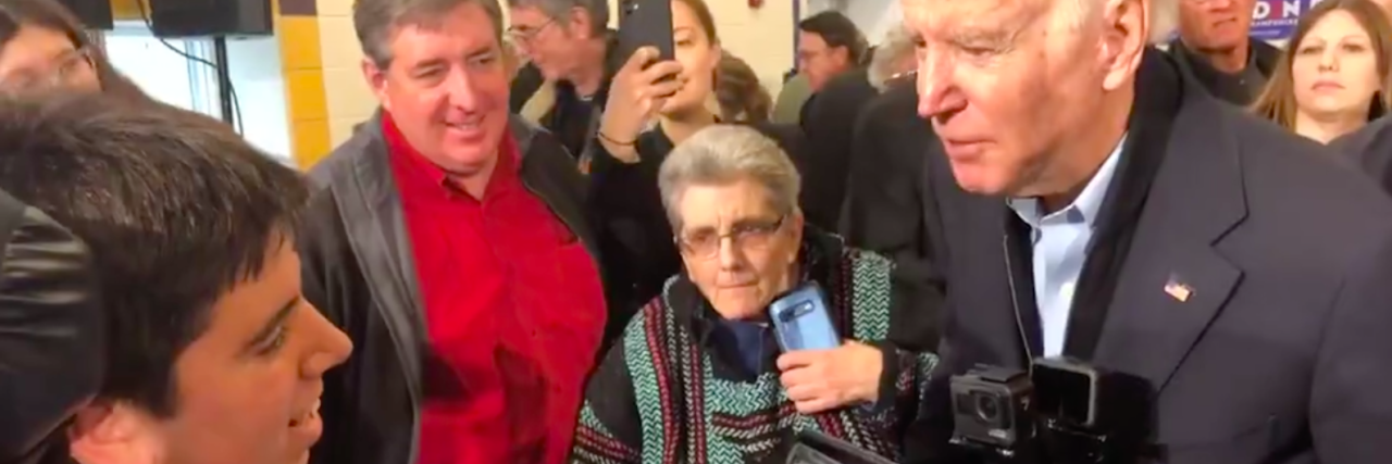 Joe Biden Stroked a Disability Advocate's Face During Policy Question Samuel Habib and Joe Biden