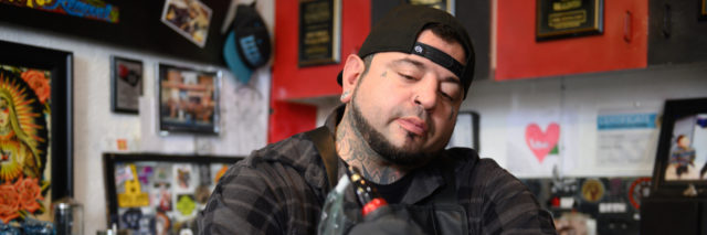 Tattoo artist Eric Catalano performs an areola tattoo procedure on Terri Battista’s breasts at Eternal Ink Tattoo Studio on Nov. 20, 2019, in Hecker, Ill. After a double mastectomy following cancer in 2013, Battista had reconstructive surgery ― but held off on areola tattoos because of the cost. Then she heard about Catalano’s shop, where breast cancer survivors could get the procedure done for free. (Michael B. Thomas for KHN)