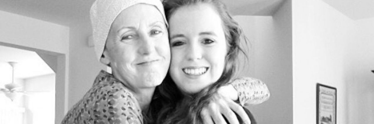 Grief Stays With Us, but So Does Love a girl and her mom hugging