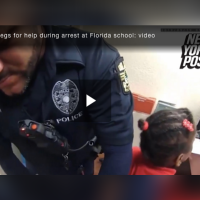 A video showing a cop hand-cuffing a young girl