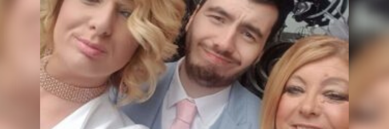 selfie of author with brother and mother, all dressed up