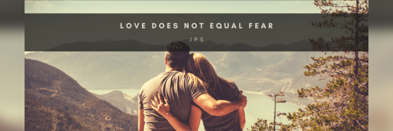 Learning That Love Does Not Equal Fear A man and woman looking out over a mountain view and lake, with the words "Love does not equal fear"