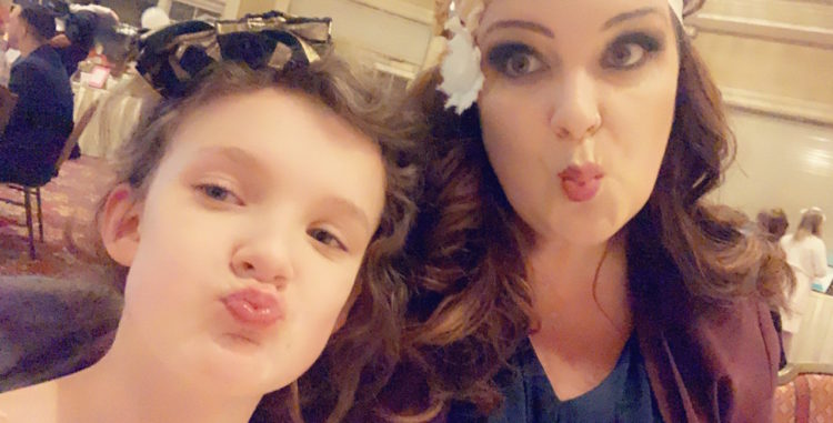 The author and her daughter making silly faces 