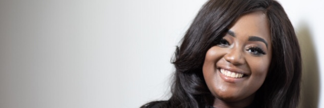 How I'm Coming to Terms With Not Catching My Bipolar Diagnosis photo of author smiling