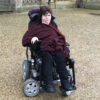 Gemma in her power wheelchair.