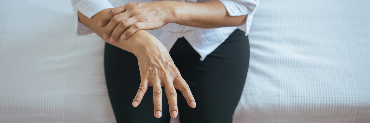 Is It Parkinson's Disease, Essential Tremor or Both? Woman with Parkinson's disease.