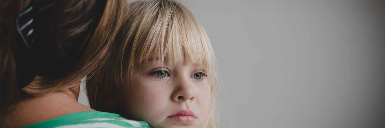 5 Ways to Help Kids Manage Anxiety During the Coronavirus Pandemic sad crying little girl hugging mother, parenting and protection
