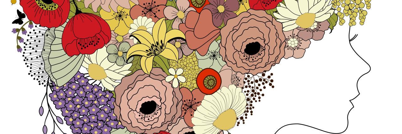 A Note About Self-Love After a Miscarriage an illustration of woman's silhouette with a floral hairstyle