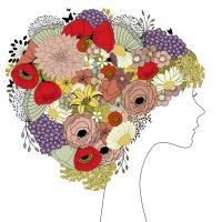 an illustration of woman's silhouette with a floral hairstyle