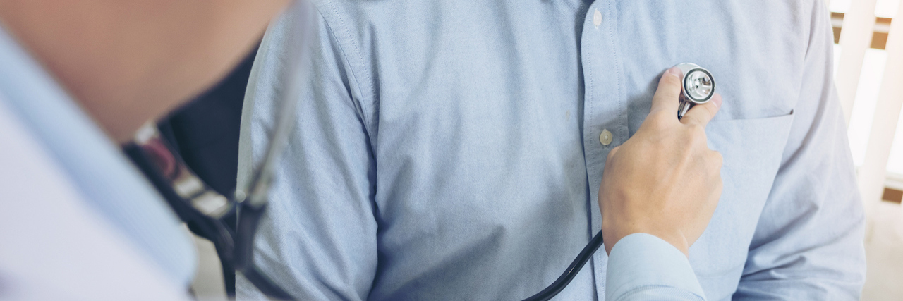 COVID-19: A Doctor on What Pulmonary Hypertension Patients Can Expect Close up of doctor listening to patient heartbeat with stethoscope on hospital, Physical examination, Medical and health care concept. (Close up of doctor listening to patient heartbeat with stethoscope on hospital, Physical examination, Medical and h
