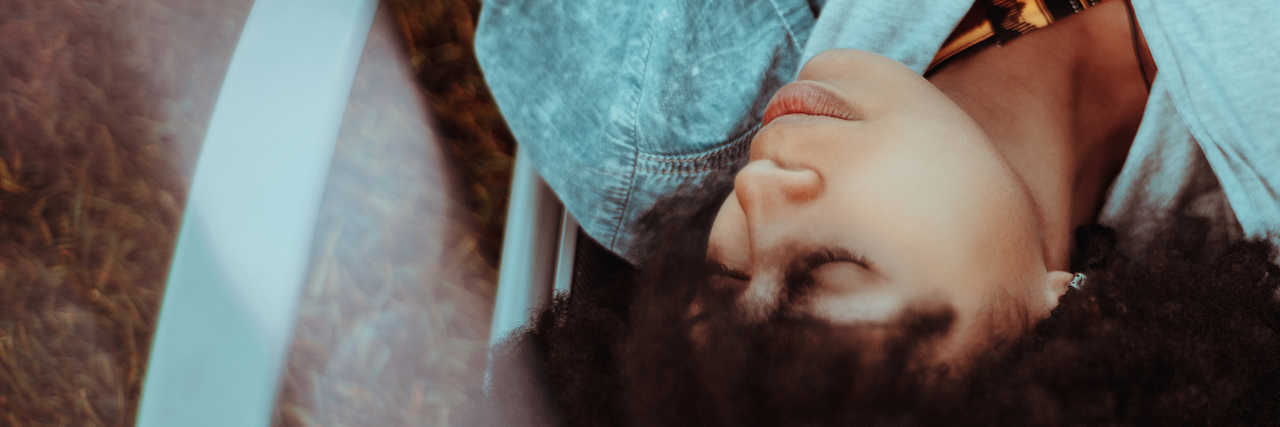 A woman lying on a couch