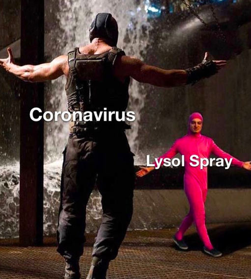 A buff man who has the word "coronavirus" over him stands intimidatingly over a shorter man in a pink outfit who has the words "lysol spray" over him